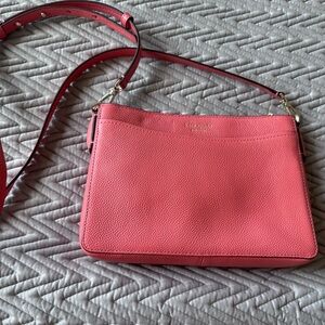 Coral Kate spade Margaux convertible crossbody and dust bag.